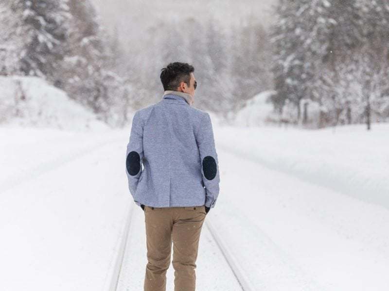 Ti walking up the track on his pre-wedding shoot in Niseko