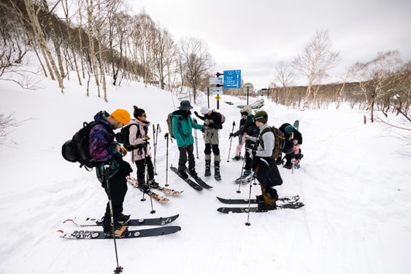 backcountry safety check on a Hokkaido guided ski and snowboard powder tour with Niseko Guiding
